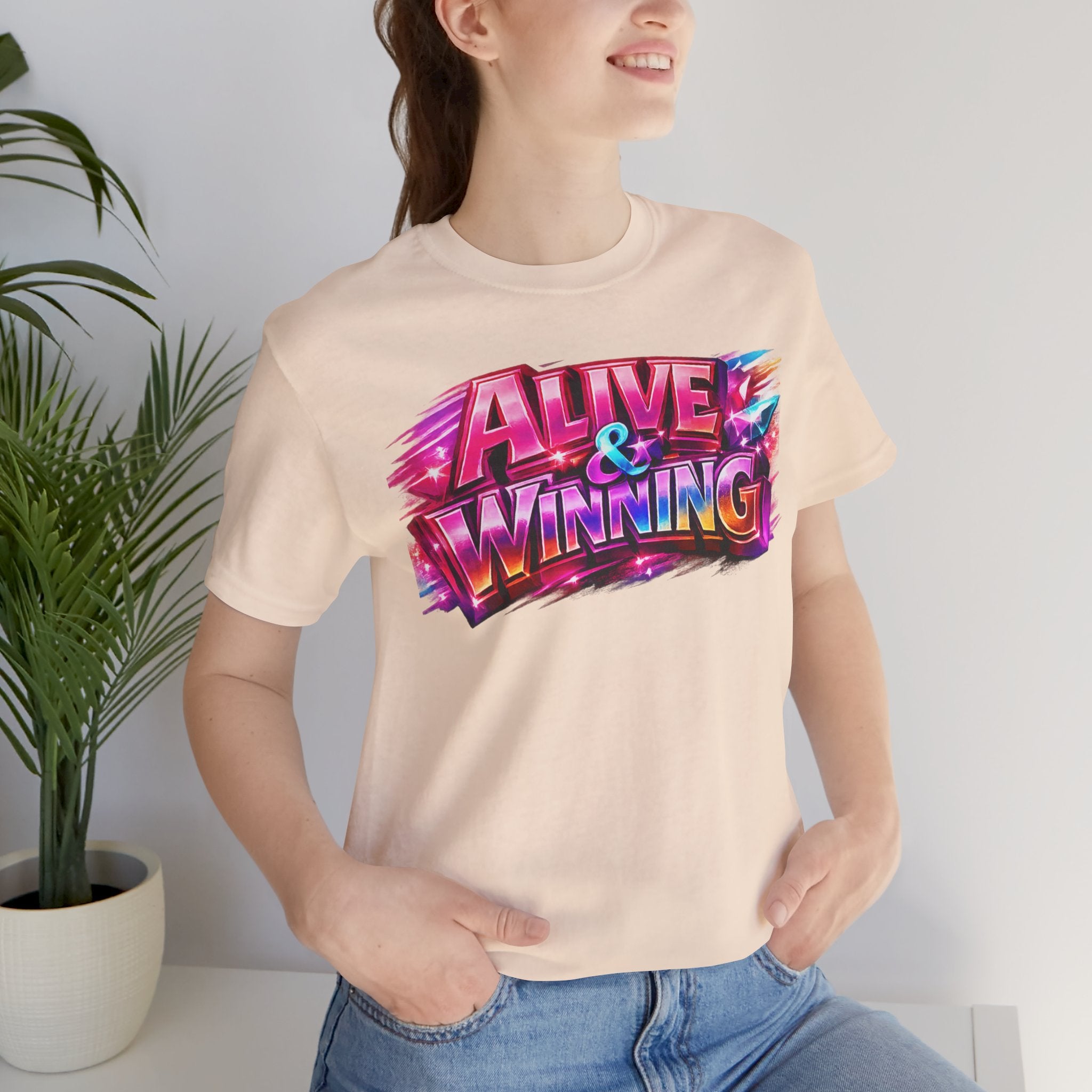 Alive & Winning Statement Graphic Tee