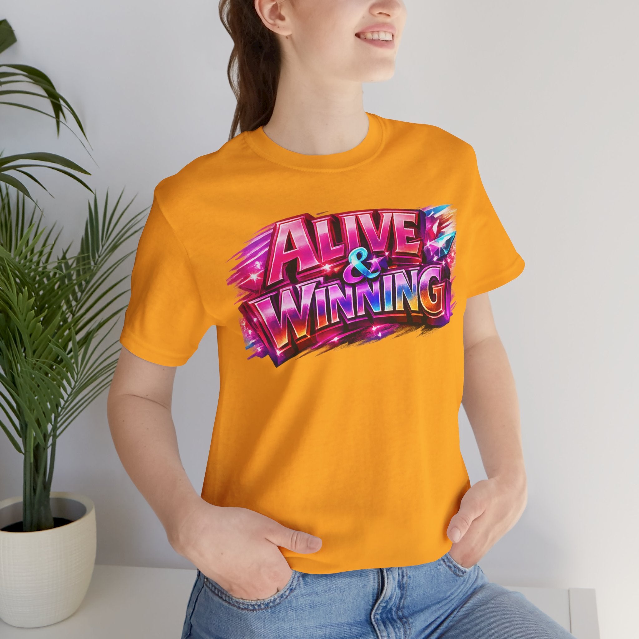 Alive & Winning Statement Graphic Tee