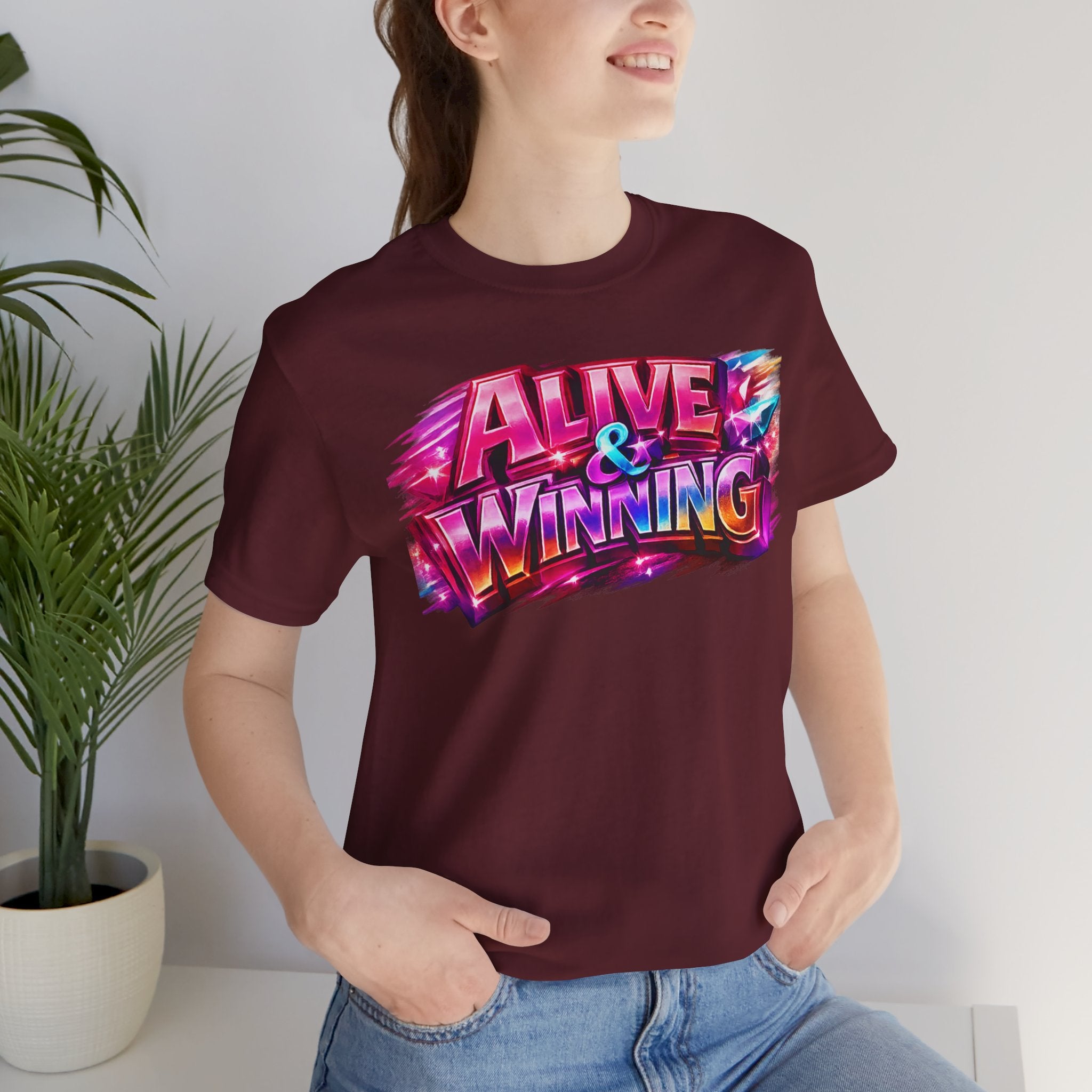 Alive & Winning Statement Graphic Tee